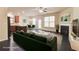 Inviting open-concept living room, seamlessly connected to the kitchen and dining area at 2205 Capella Sw Cir, Atlanta, GA 30331
