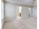 Large main bedroom with neutral carpet and multiple entryways at 2205 Capella Sw Cir, Atlanta, GA 30331
