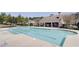 Large community pool area, perfect for relaxing and enjoying the outdoors, with nearby clubhouse at 2205 Capella Sw Cir, Atlanta, GA 30331