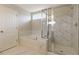 Bathroom featuring tiled floor, bathtub, and shower with glass enclosure at 4256 Azalea Ridge Way, Hoschton, GA 30548