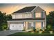 Charming two-story home showcasing a brick facade, complemented by a well-manicured lawn and a two-car garage at 4256 Azalea Ridge Way, Hoschton, GA 30548