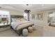 Elegant main bedroom with stylish decor, plenty of natural light, and a luxurious feel at 4256 Azalea Ridge Way, Hoschton, GA 30548