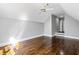 Finished attic space with hardwood floors, neutral paint and ample natural light at 525 James Lee Dr, Suwanee, GA 30024