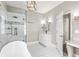 Bathroom featuring walk in shower and white cabinets at 525 James Lee Dr, Suwanee, GA 30024