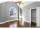 Bedroom with vaulted ceiling, large window and closet at 525 James Lee Dr, Suwanee, GA 30024