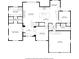 Detailed floor plan featuring dimensions of the primary bedroom, kitchen, living room, and garage at 525 James Lee Dr, Suwanee, GA 30024