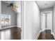 Hallway leading to bedroom with large window at 525 James Lee Dr, Suwanee, GA 30024