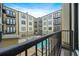 Balcony view overlooking the pool and courtyard of this multi-story condo building at 5300 Peachtree Rd # 1212, Atlanta, GA 30341