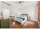 Charming bedroom with ceiling fan, natural light and wood floors at 5300 Peachtree Rd # 1212, Atlanta, GA 30341