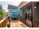 Outdoor deck featuring a dining area with an umbrella, perfect for entertaining at 161 Dorys Way, Dallas, GA 30157