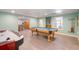 Basement with pool table, air hockey, and bar area, perfect for entertaining at 161 Dorys Way, Dallas, GA 30157