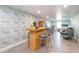 Finished basement area with bar and entertainment center, perfect for relaxing at 161 Dorys Way, Dallas, GA 30157