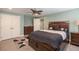 Bedroom with King bed, walk-in closets, ceiling fan and natural light at 161 Dorys Way, Dallas, GA 30157