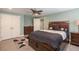 Bedroom with walk in closet, queen sized bed, and tiled floors at 161 Dorys Way, Dallas, GA 30157