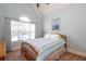 Bedroom featuring neutral tones and a large window at 161 Dorys Way, Dallas, GA 30157