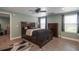 Spacious bedroom with a ceiling fan, gray rug and tile flooring and great natural light at 161 Dorys Way, Dallas, GA 30157