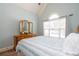 Bedroom featuring neutral tones and a vanity dresser at 161 Dorys Way, Dallas, GA 30157