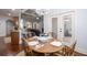 Cozy dining area with seating for four and an open concept to the kitchen and living area at 161 Dorys Way, Dallas, GA 30157
