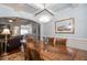 Dining room showcasing a wooden table, elegant chandelier, hardwood floors, and an open-concept layout at 161 Dorys Way, Dallas, GA 30157