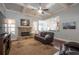 Spacious living room with stone fireplace, coffered ceilings and hardwood floors with great flow into kitchen at 161 Dorys Way, Dallas, GA 30157