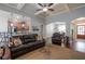 Inviting living room showcases hardwood floors, ceiling fan and great flow into dining room and kitchen at 161 Dorys Way, Dallas, GA 30157