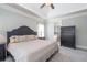 This main bedroom provides lots of natural light and a view of the attached bathroom at 161 Dorys Way, Dallas, GA 30157