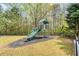 Neighborhood playground including slide and climbing bars for recreation at 161 Dorys Way, Dallas, GA 30157