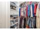 Spacious walk-in closet providing ample storage with custom shelving and hanging rods at 161 Dorys Way, Dallas, GA 30157