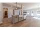 Spacious kitchen island with granite countertops and a farmhouse sink at 210 Pinewood Dr, Covington, GA 30014