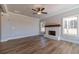 Living room showcasing a fireplace and large windows at 210 Pinewood Dr, Covington, GA 30014