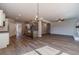 Open living area with kitchen, dining, and fireplace at 210 Pinewood Dr, Covington, GA 30014