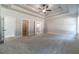 Spacious main bedroom with tray ceilings and a walk-in closet at 210 Pinewood Dr, Covington, GA 30014