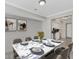 Dining room view featuring formal table setup and an open design to the kitchen at 2390 Lawrenceville Hwy # K, Decatur, GA 30033
