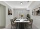 Dining room showcasing a formal table setting with elegant decor and artwork at 2390 Lawrenceville Hwy # K, Decatur, GA 30033