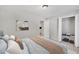 Cozy main bedroom with neutral decor, comfortable bed, and ample closet space at 2390 Lawrenceville Hwy # K, Decatur, GA 30033