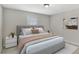 Bedroom with a neutral color palette, bright window, and comfortable furnishings at 2390 Lawrenceville Hwy # K, Decatur, GA 30033