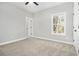 Light and airy bedroom with plush neutral carpet, freshly painted and ceiling fan at 25 Fourwood Dr, Covington, GA 30016