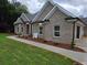 Charming brick home with manicured lawn and landscaping at 25 Fourwood Dr, Covington, GA 30016