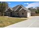 Charming brick home with attached garage and long driveway at 25 Fourwood Dr, Covington, GA 30016