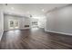 Spacious living room with fireplace, ceiling fan, and natural light at 25 Fourwood Dr, Covington, GA 30016