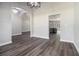 View of open floor plan with arched entryway to dining and kitchen at 25 Fourwood Dr, Covington, GA 30016
