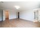 Bright bedroom with hardwood floors and multiple entry doors at 125 Priestwood Ln, Acworth, GA 30102