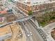 Aerial shot of the community streets and surrounding commercial area with a bridge at 1286 Calhoun Sw Ter, Atlanta, GA 30314