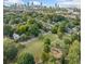 Gorgeous aerial view showcasing neighborhood park and the Atlanta skyline in the distance at 1286 Calhoun Sw Ter, Atlanta, GA 30314
