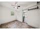 Simple bedroom featuring neutral walls, a window, and view into the kitchen at 1286 Calhoun Sw Ter, Atlanta, GA 30314