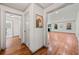 Bright entryway showcasing hardwood floors and views into the living area and adjacent rooms at 1286 Calhoun Sw Ter, Atlanta, GA 30314