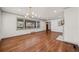 Bright living room featuring hardwood floors, a fireplace, and large windows offering natural light at 1286 Calhoun Sw Ter, Atlanta, GA 30314