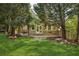 Expansive backyard features a brick patio and lush landscaping, offering an inviting outdoor living space at 1820 Buckhead Valley Ne Ln, Atlanta, GA 30324