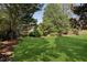 Lush backyard with trees and flowering bushes for a private, peaceful retreat at 1820 Buckhead Valley Ne Ln, Atlanta, GA 30324