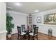 Elegant dining room with decorative moldings, modern lighting, and seating for four at 1820 Buckhead Valley Ne Ln, Atlanta, GA 30324